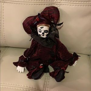 Burgundy porcelain cat doll